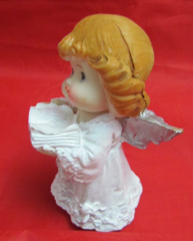 Фигурка Ангелочек малыш с серебристыми крыльями полистоун 8,2х4,5х4,5 см второй сорт