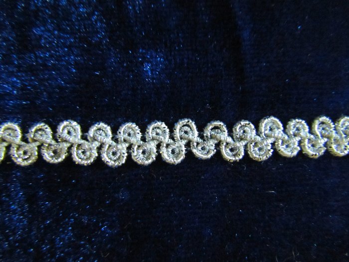 Тесьма серебро 43, 50 м всупаковке